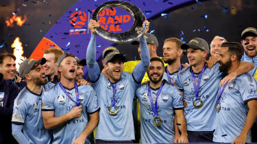 Sydney FC players celebrate after beating Perth Glory in May to win the the A-League grand final, the last to be held under the control of the FFA.