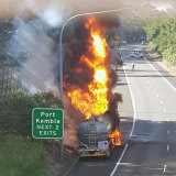 Andy Gilmour managed to get a few photos of the tanker in flames from an overpass shortly after the truck caught fire.