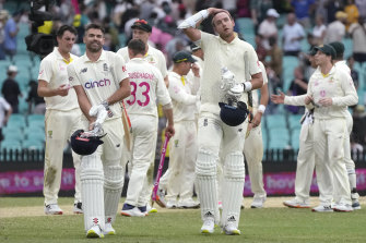 England’s not out duo James Anderson and Stuart Broad walk off at the end of their Ashes Test against Australia in Sydney.