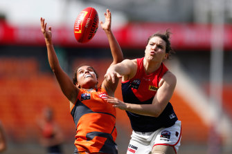 The Giants' Haneen Zreika contests the ball with Melbourne's Maddison Gay on Saturday.