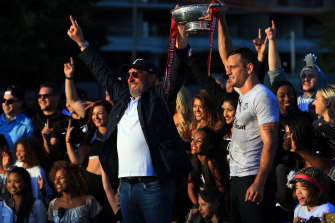 Toronto Wolfpack owner David Argyle, left, lifts the Championship 1 Promotion Trophy in 2017.