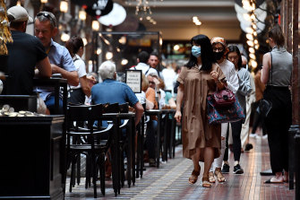 People shopping at the Strand Arcade on Monday.