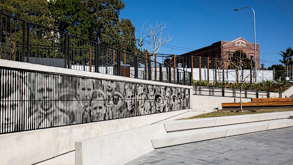 An artists' mural in the sunken public square next to the new Marrickville Library.