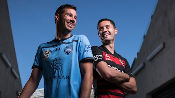 Brothers in arms: Ryan McGowan (left) and Dylan McGowan face off in Saturday's derby. 