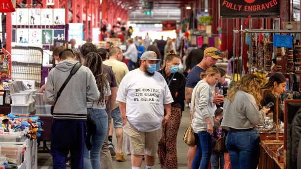 Shoppers return Melbourne’s Queen Victoria Market after lockdown.