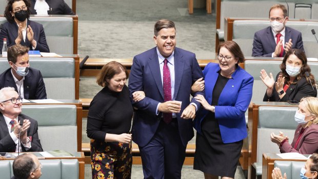 Oxley MP Milton Dick is “dragged” to the Speaker’s chair – as is the tradition – after his election to the role in July.