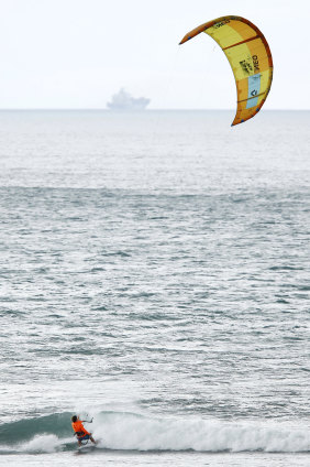 "I love it": 19-year-old kitesurfer James Carew practises at Torquay on Sunday.