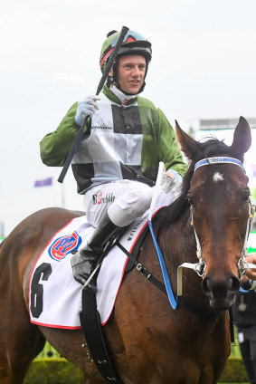 Brett Prebble returns to the mounting yard after the win by Incentivise. 