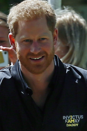 Prince Harry wears a jumper reading 'Invictus Family: I am daddy' which was given to him during the launch of the next Invictus games in The Hague on May 9.  As a man, he is "primed for parenthood" as well as a woman.