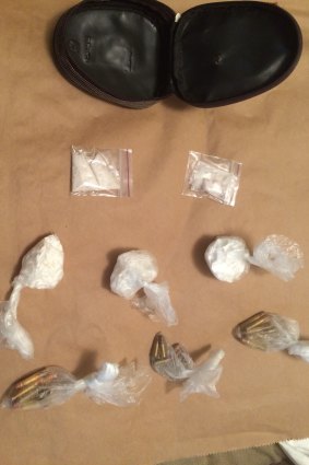 Cocaine and ammunition allegedly found during the search of Lucas Clark's home.