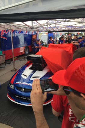 The covers come off Maurice Fabietti's 3000-horsepower Monaro drag car at Summernats