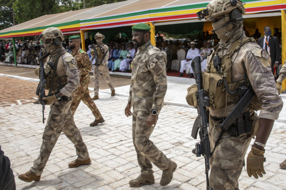 Leader of Mali’s ruling junta, Lieutenant Colonel Assimi Goita (centre), at a military parade in Bamako, Mali in 2022.