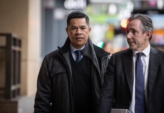 Simiona Tuteru (left) arrives at court on Tuesday with his lawyer David Hallowes.