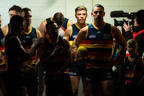 Eddie Betts alongside former Crows teammate Taylor Walker in 2019.