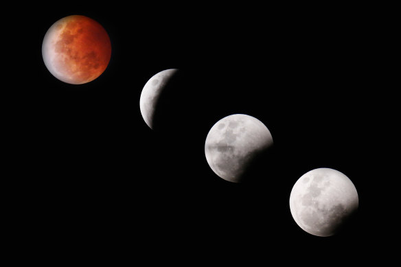 The blood Moon, or lunar eclipse, is seen over Melbourne in 2014.