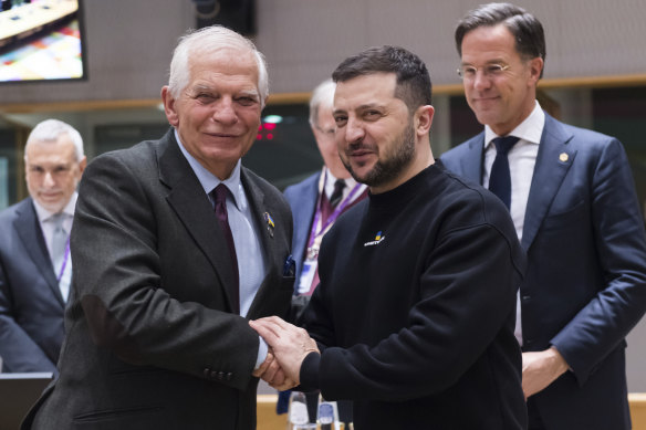 European Union foreign policy chief Josep Borrell, left, shakes hands with Ukraine’s President Volodymyr Zelenskyy during a round table meeting at February’s EU summit in Brussels.
