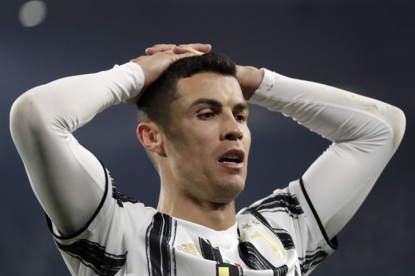 Cristiano Ronaldo reacts after missing a chance against Porto.