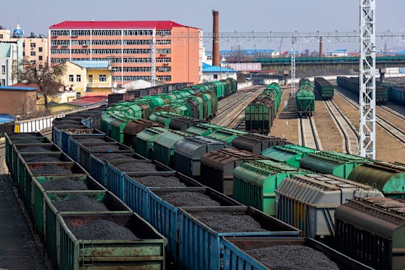 Coal exported from Russia sitting on the train tracks in Manzhouli.