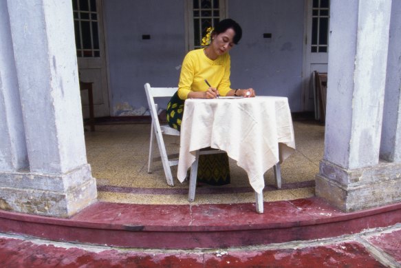 Suu Kyi under house arrest in her dilapidated mansion in Yangon (formerly Rangoon) in 1996.