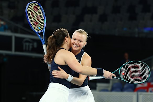 Harriet Dart (right) and Jodie Burrage celebrate Great Britain’s upset win over Australia.