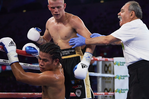 Liam Wilson knocks down Rodynie Rafol on the undercard of the light-middleweight world title elimination bout between Tim Tszyu and Bowyn Morgan in Sydney in 2020.