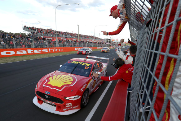 Scott McLaughlin takes the checkered flag to win the 2019 Bathurst 1000.