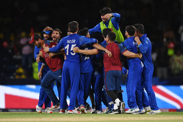 Afghanistan celebrate their victory over Australia at the T20 World Cup.