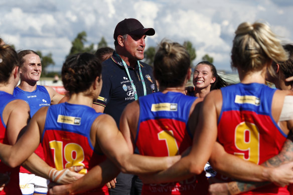 Craig Starcevich sings the team song with his victorious Lions.