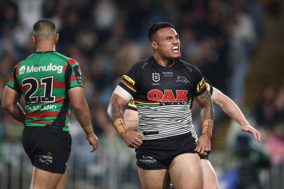 Spencer Leniu celebrates a try against Souths last year.