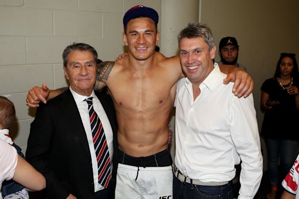 Politis with Sonny Bill Williams and David Gyngell after the Roosters’ win in the 2013 grand final against Manly.