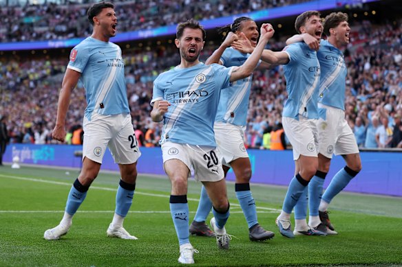 Bernardo Silva leads the celebrations after Manchester City took the lead against Southampton at Wembley.