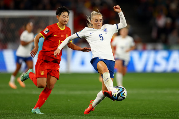 England’s Alex Greenwood in action with China’s Wu Chengshu.