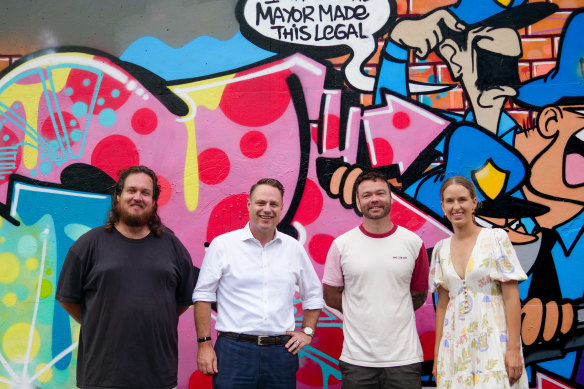 From left: Brisbane artist Matt Tervo, Lord Mayor Adrian Schrinner, muralist Fintan Magee and Lisa Atwood, councillor for Doboy Ward, at the launch of Brisbane’s second legal public art wall. 