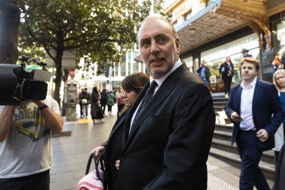 Brian Houston leaves Downing Centre Local Court on Friday.