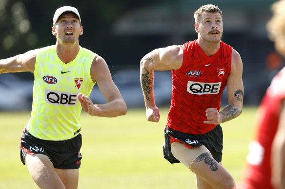 Lachlan McAndrew and Peter Ladhams during Swans training on Thursday.