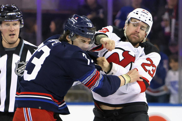 New Jersey’s Kurtis McDermid (right) and Matt Rempe go toe to toe.