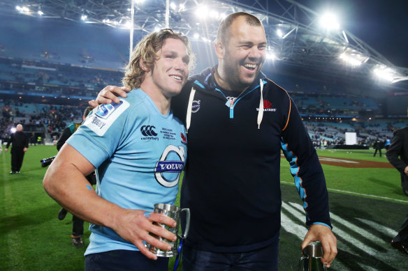 Michael Cheika and Michael Hooper celebrate victory over the Crusaders in the Super Rugby decider in 2014.