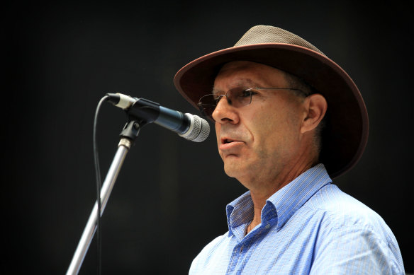 David Adler speaking at a rally in 2017.