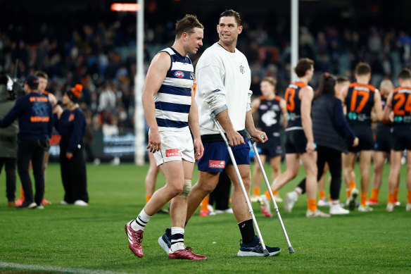 Tom Hawkins finished Friday night’s game on crutches with a foot injury.