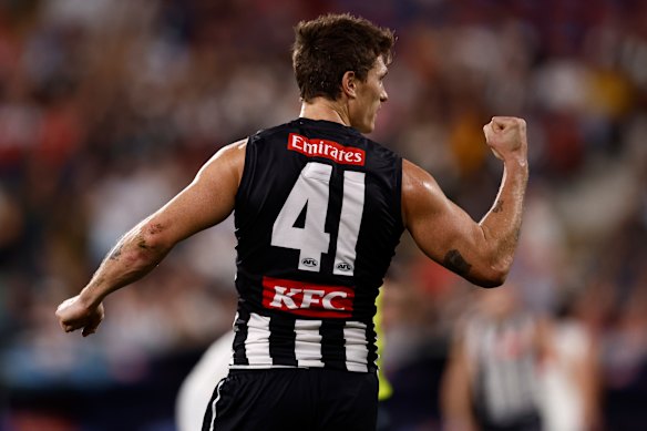 Magpie Brody Mihocek celebrates a goal.