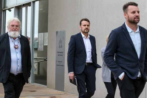 Geoff Clark and sons Jeremy (middle) and Aaron outside court in 2019.
