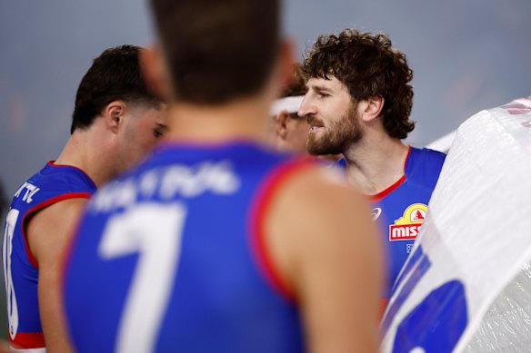 Marcus Bontempelli of the Bulldogs runs out with his side.