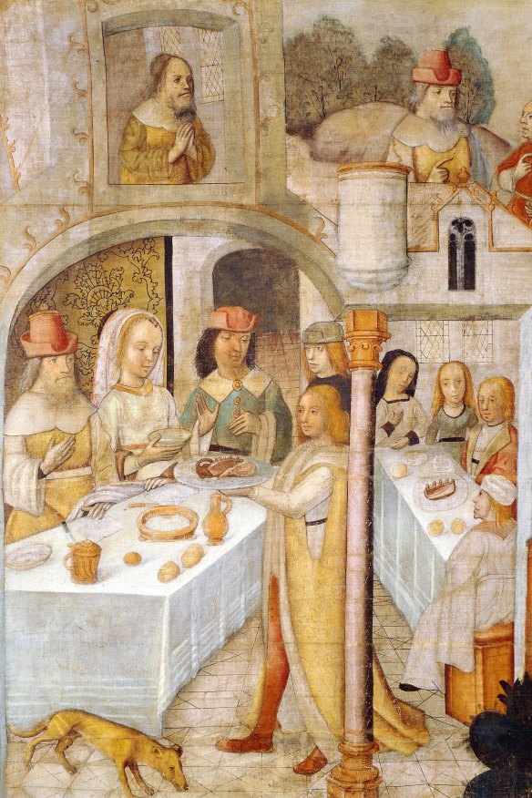 A (rather sanitised) version of a medieval feast from the biblical book of Job, painted in Cremona, Italy. But notice the dog scrounging for scraps.
