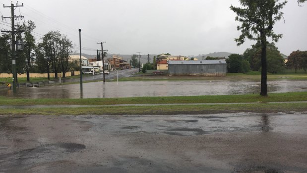 Water laps at Hooke Street, Dungog, after heavy rainfall on Wednesday.  By Thursday, the road was under water.