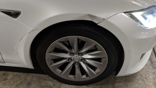 More damage to the Tesla.