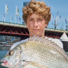 Taylor Rogers, 15, fishing at Darling Harbour on Saturday.