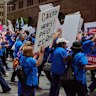 Nurses and midwives march through Sydney’s CBD during one of three statewide strikes in 2024. 
