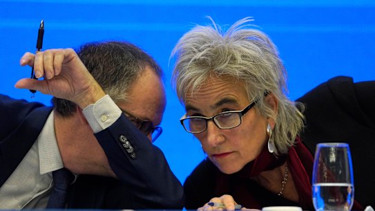 Marion Koopmans, right, and Peter Ben Embarek of a World Health Organisation team chat to each other during the joint press conference in Wuhan. 