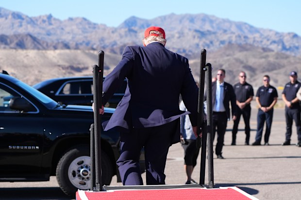 President Donald Trump departs a campaign rally at the Laughlin Bullhead International Airport in Arizona.