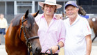 Coolmore’s Tom Magnier and Gerry Harvey with the prized Sunlight filly at the Magic Millions sales.